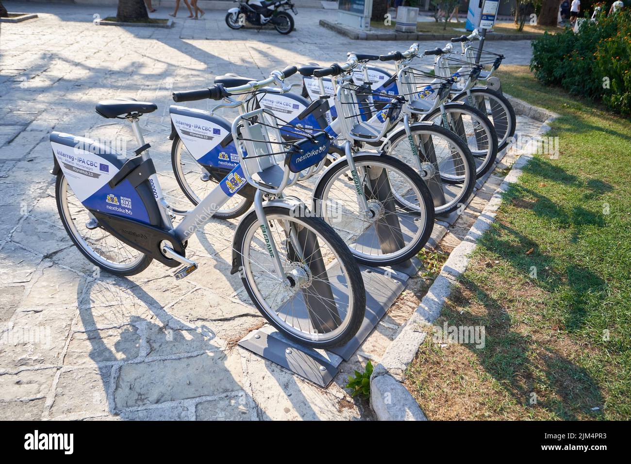 Parked electric bikes by Nextbike for rent Stock Photo