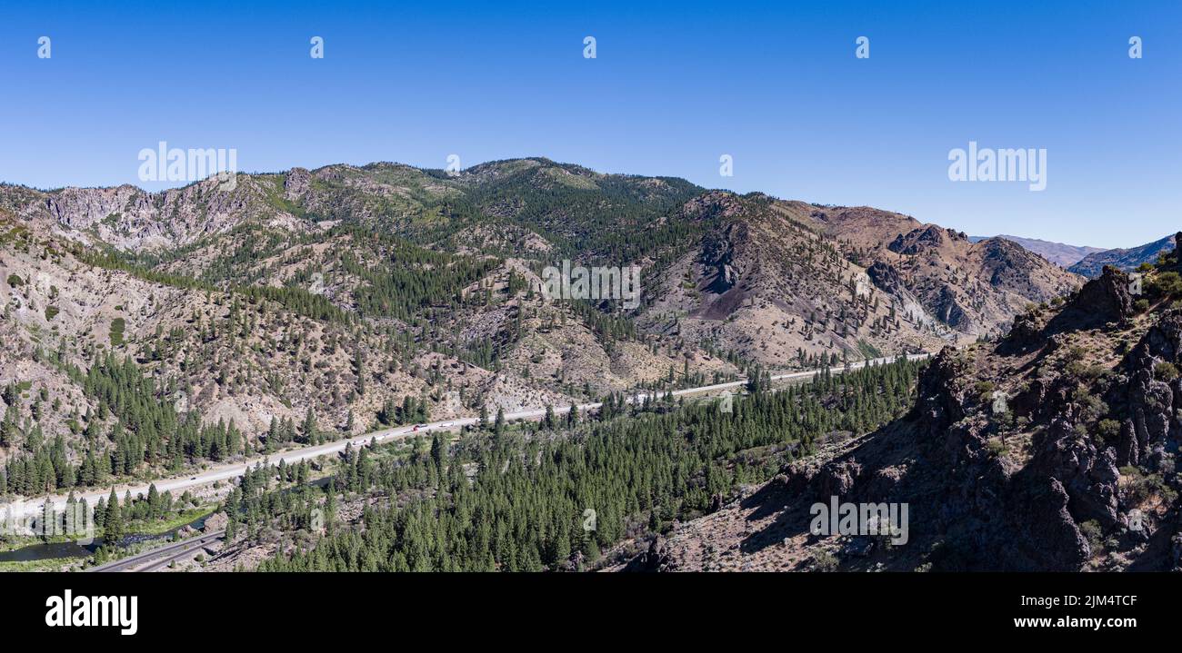 Interstate 80 highway runs through a deep canyon in northern California between Truckee and Reno. Stock Photo