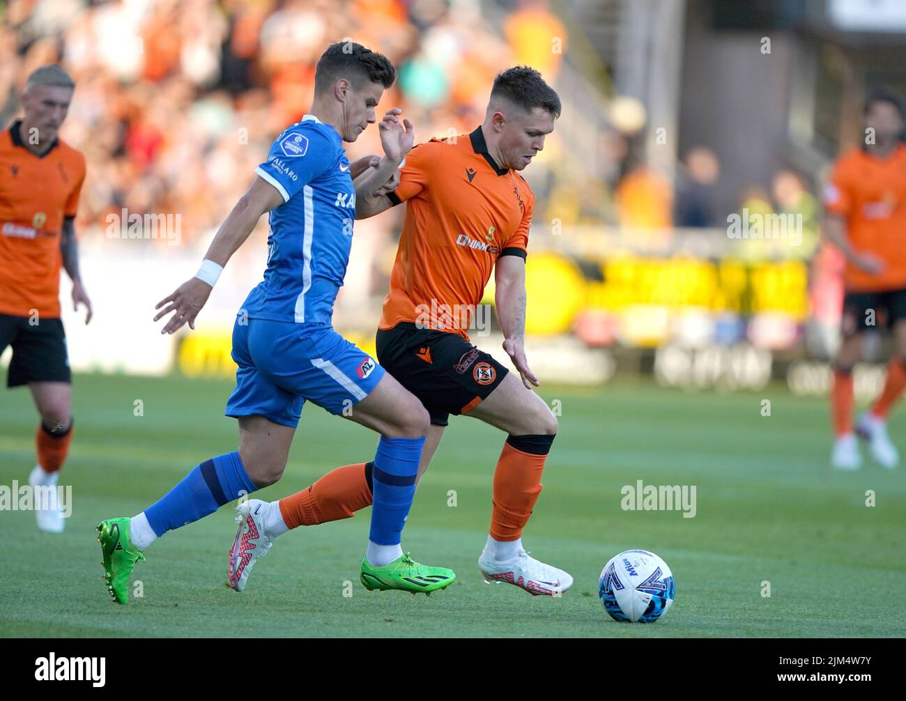 Dundee United's Glen Middleton (right) challenges AZ Alkmaar's Milos Kerkez during the UEFA Europa Conference League third qualifying round, first leg match at Tannadice Park, Dundee. Picture date: Thursday August 4, 2022. Stock Photo