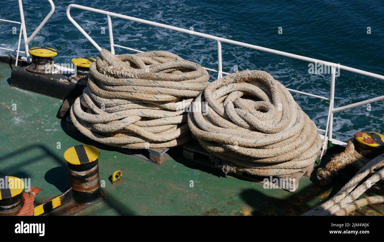 A ship with ropes on the deck during the daytime Stock Photo - Alamy