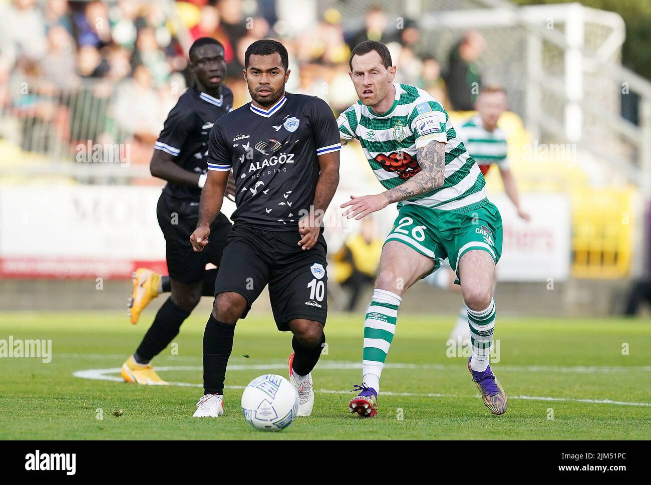 Shamrock Rovers' Chris McCann (right) in action against Shkupi's Freddy Alvarez during the UEFA Europa League third qualifying round, first leg match at the Tallaght Stadium in Dublin, Ireland. Picture date: Thursday August 4, 2022. Stock Photo