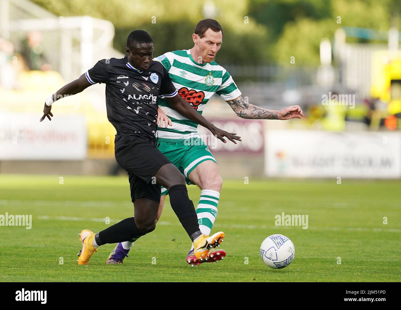Shamrock Rovers' Chris McCann (right) in action against Shkupi's Diene Albert Lamane during the UEFA Europa League third qualifying round, first leg match at the Tallaght Stadium in Dublin, Ireland. Picture date: Thursday August 4, 2022. Stock Photo