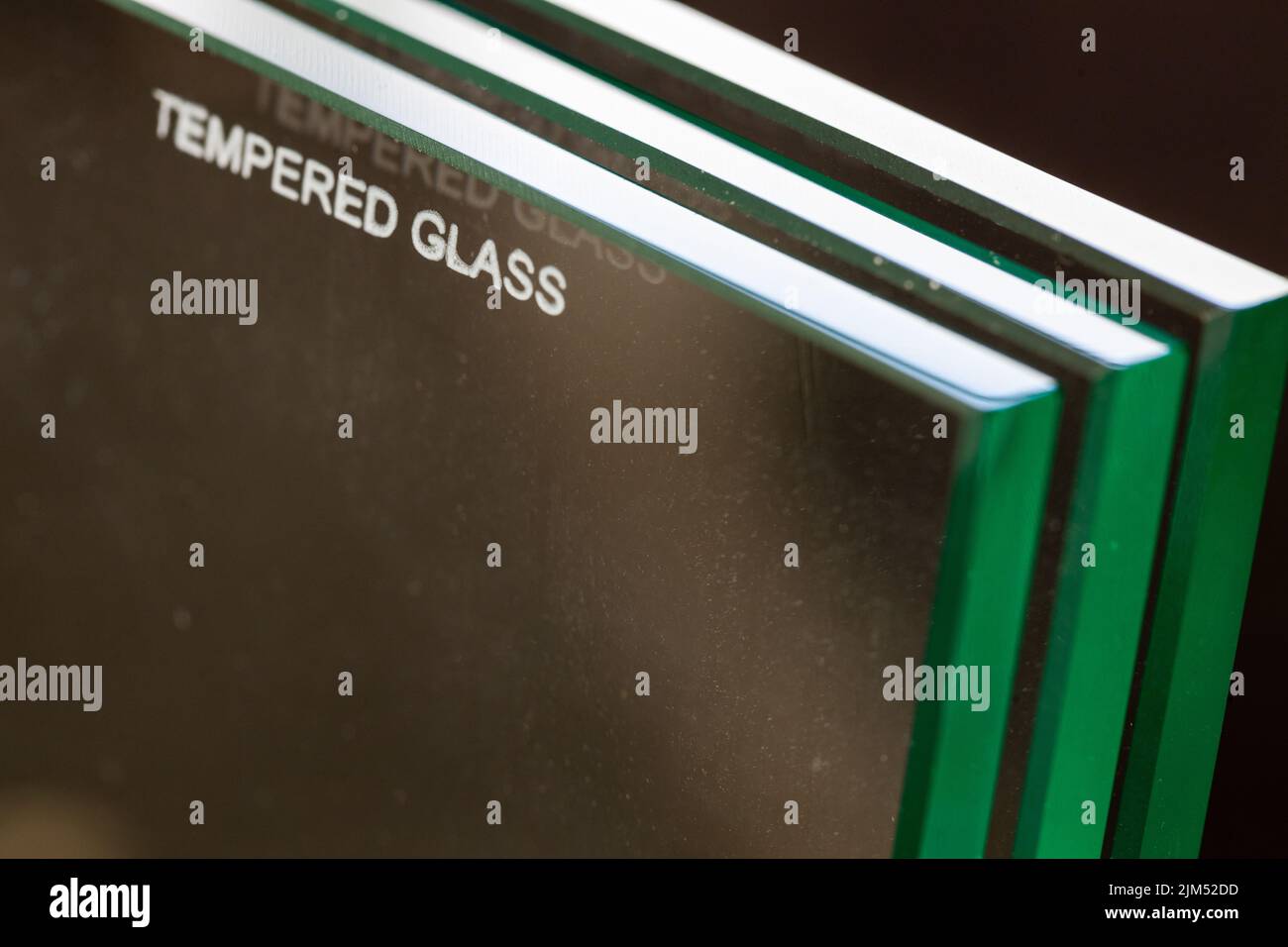 toughened glass, closeup, fired glass tempering markings Stock Photo