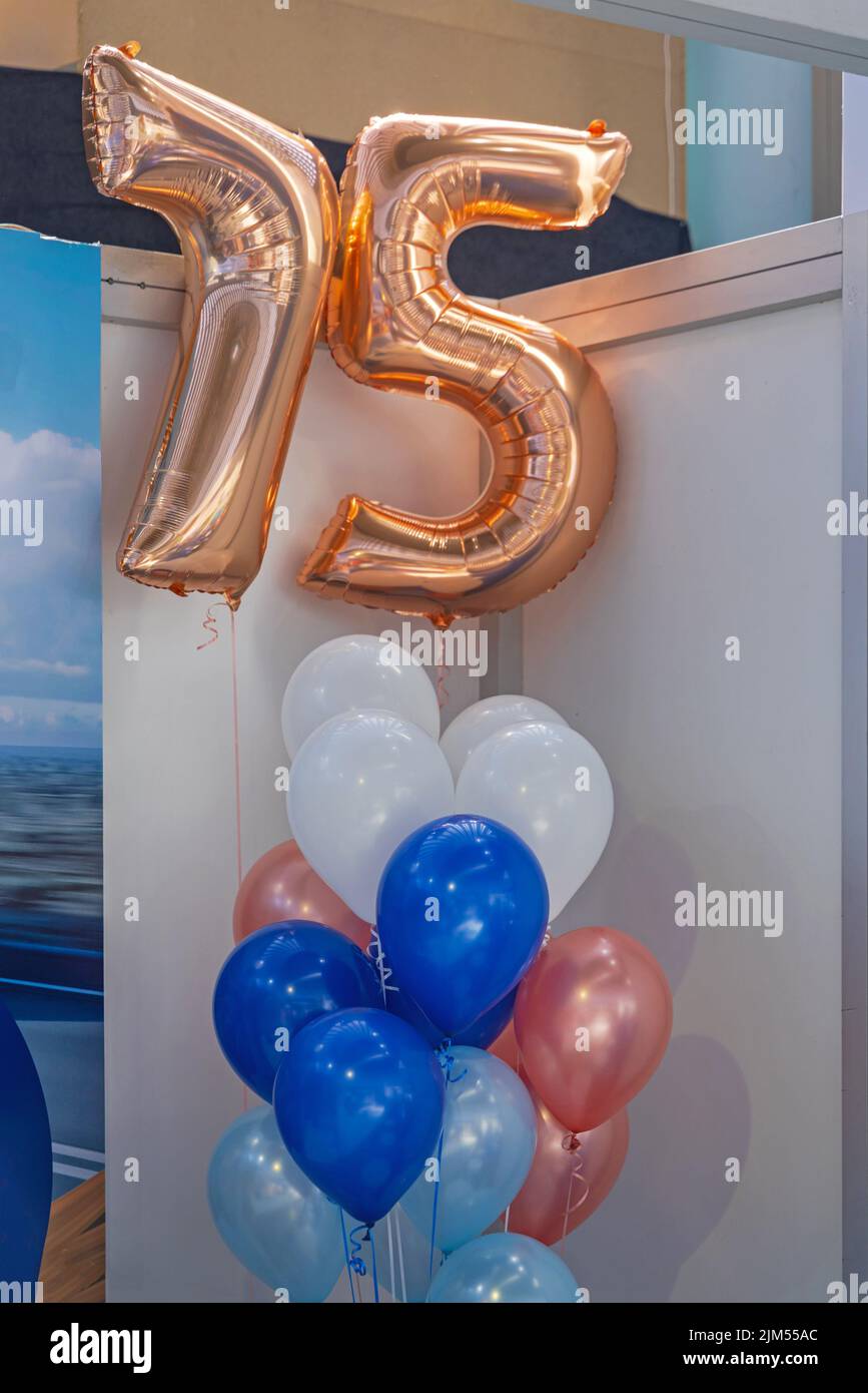 Seventy Five Years Birthday Party Celebration Foil Helium Balloons Stock Photo