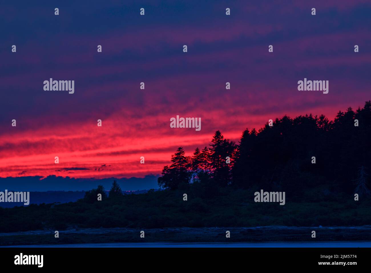 July 31, 2022.  Barnes Island.  Twilight  view from Barnes Island.  Casco Bay, Maine Stock Photo