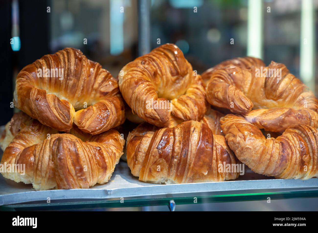 Butter puff croissants on display in artisanal bakery in San Sebastian
