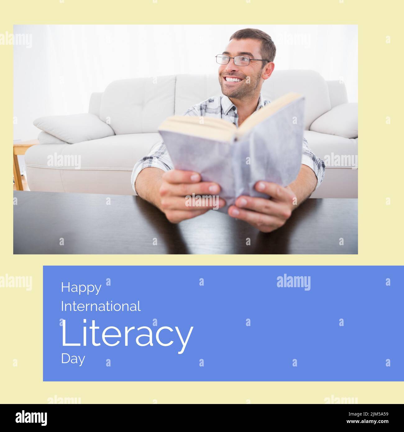 Caucasian adult man smiling while reading book with happy international