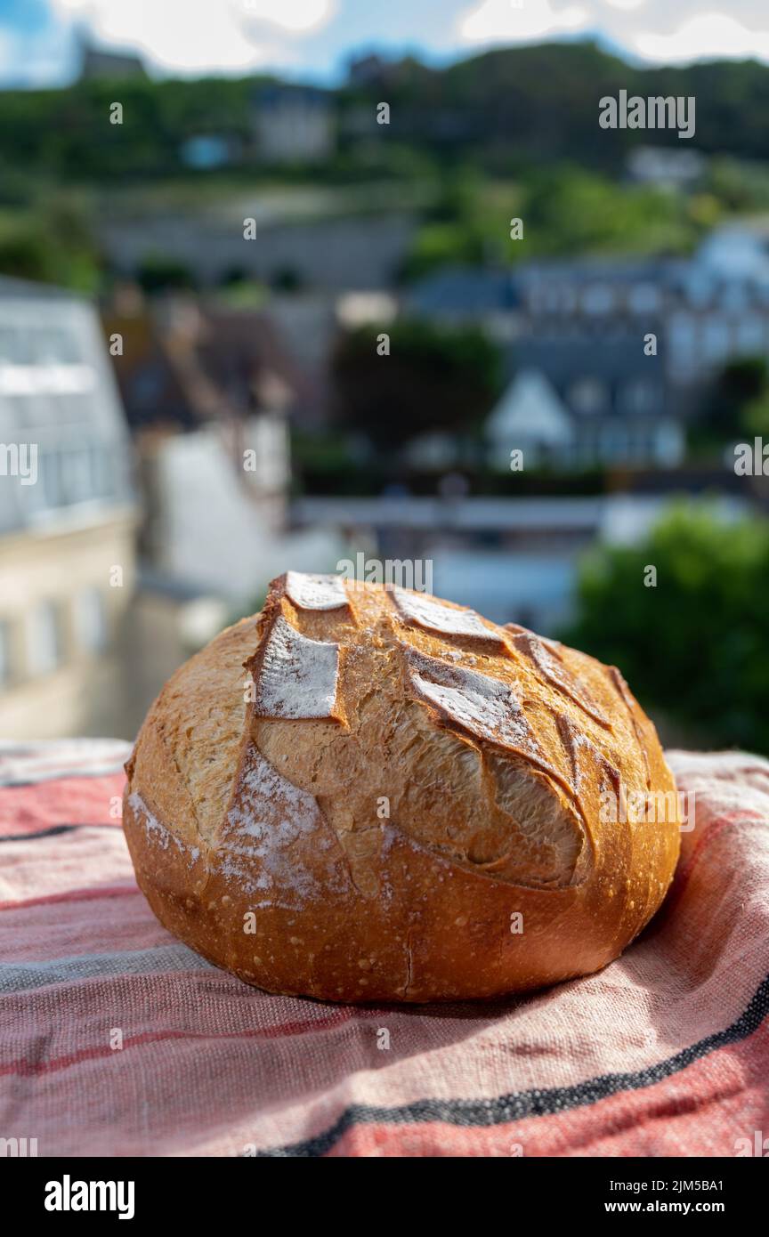 White wheat round baked farmers bread pain from artisanal French bakery ...