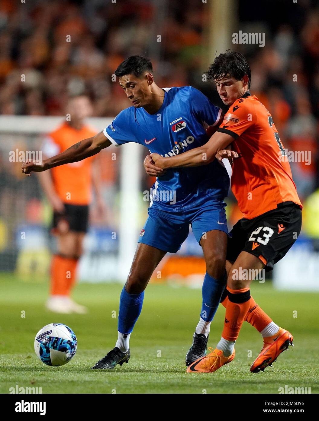 Dundee United's Ian Harkes (right) challenges AZ Alkmaar's Tijjani Reijnders during the UEFA Europa Conference League third qualifying round, first leg match at Tannadice Park, Dundee. Picture date: Thursday August 4, 2022. Stock Photo