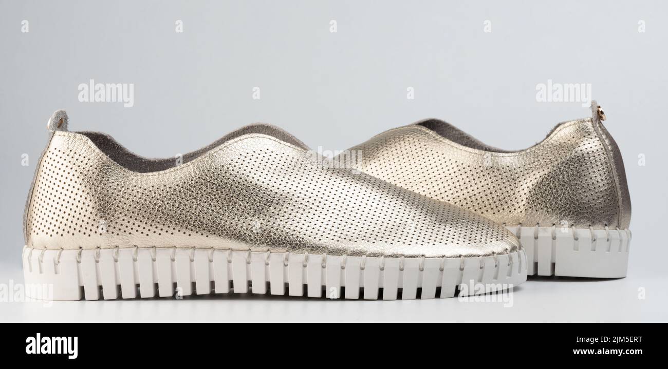 Modern perforated shoes side view isolated on studio background Stock Photo