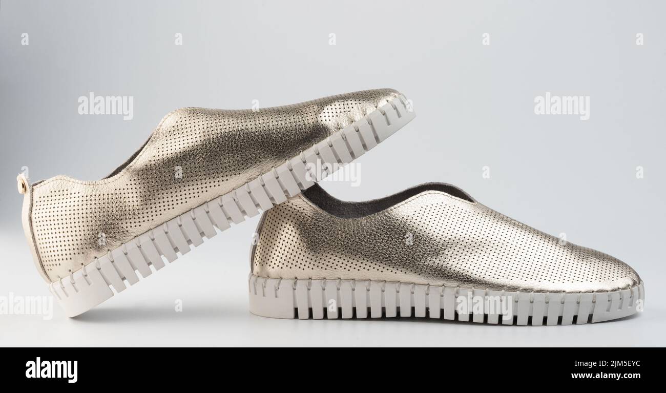Elegant shiny pair shoes isolated on white studio background Stock Photo
