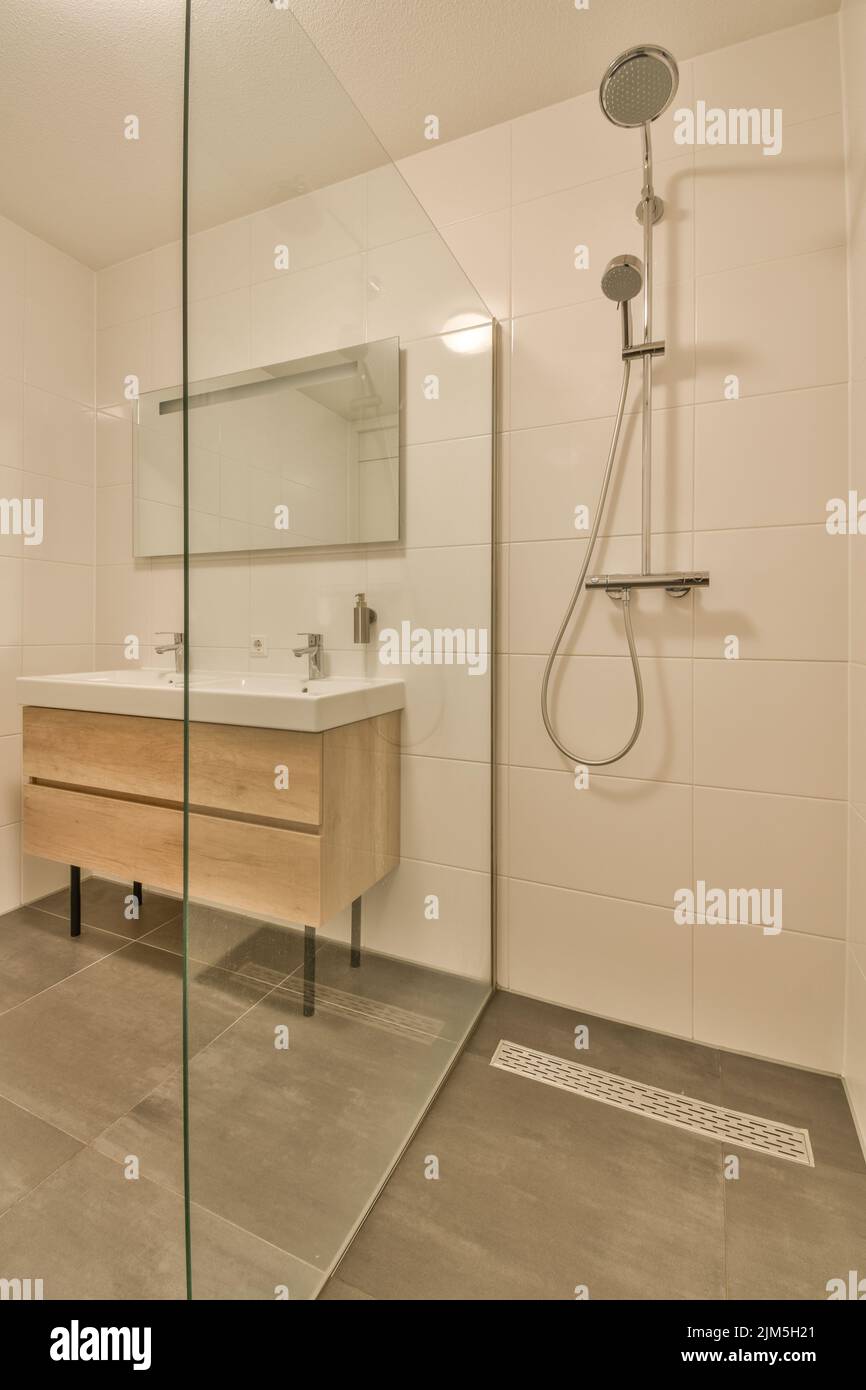 Interior of contemporary bathroom and restroom with shower , toilet and