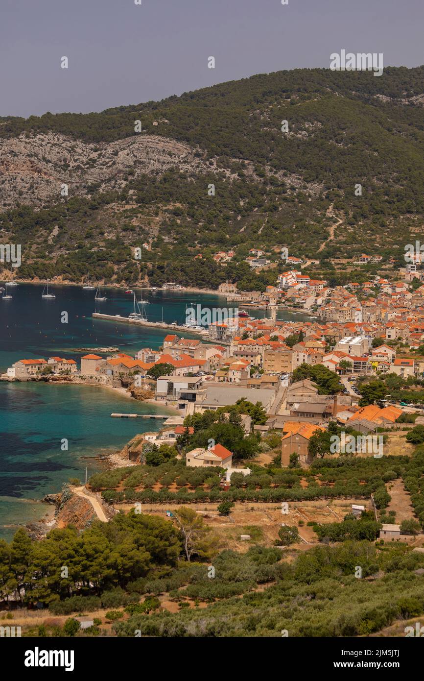 KOMIZA, VIS, CROATIA, EUROPE - Coastal town of Komiza, on the island of Vis, in the Adriatic Sea. Stock Photo