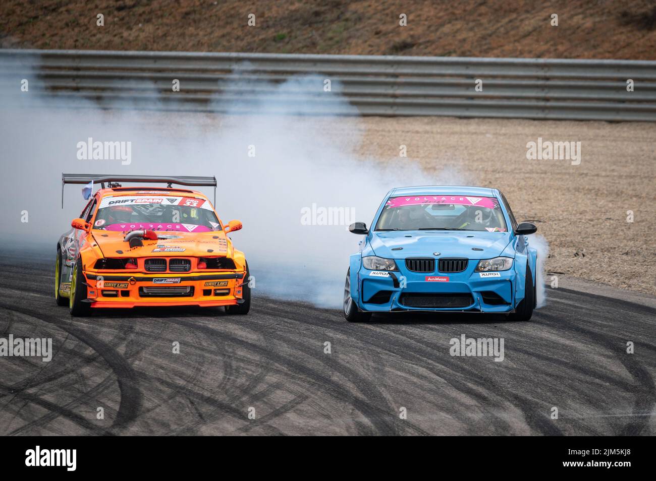 Bmw 3 Series E90 drifting on the circuit Stock Photo