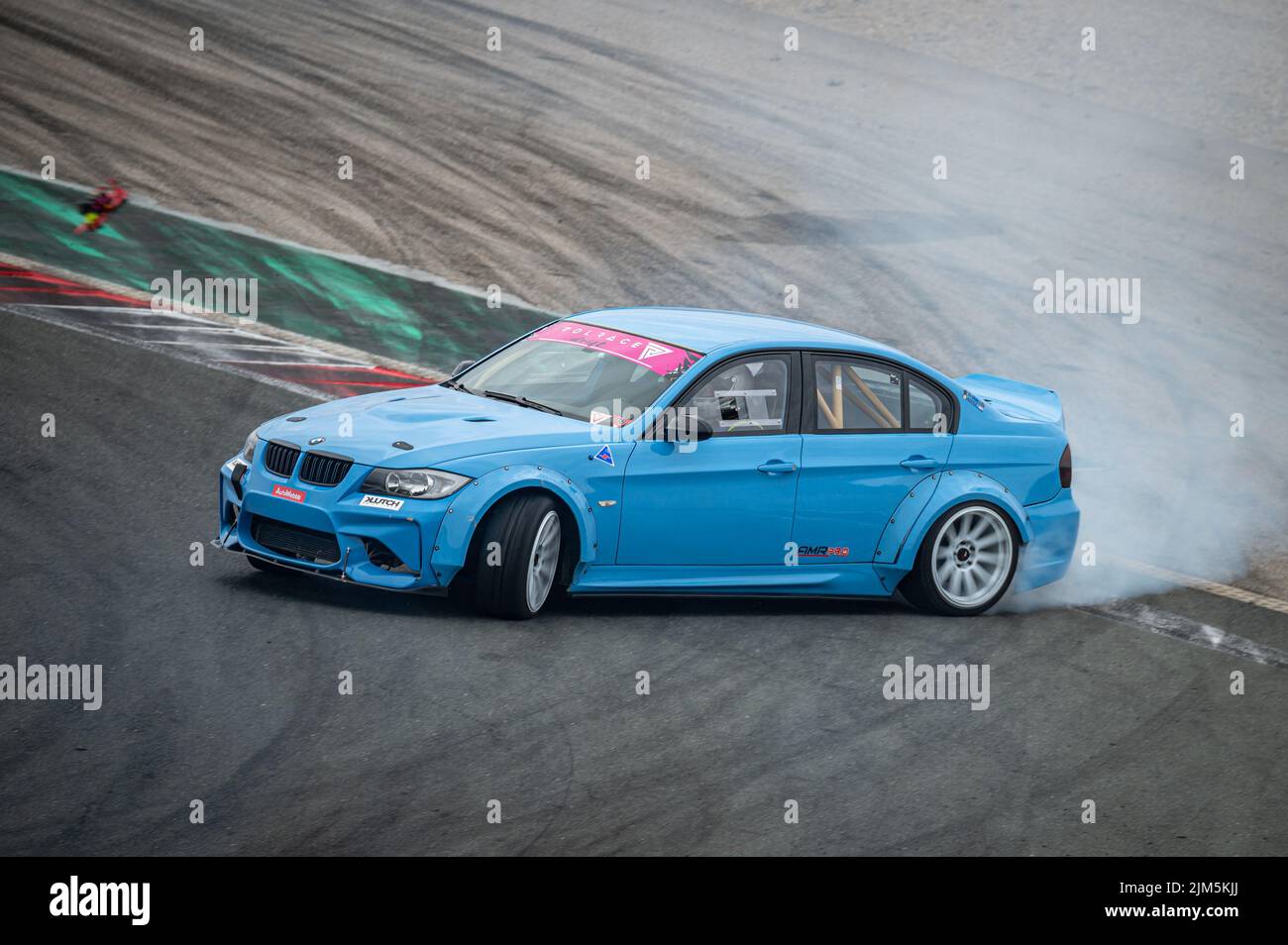 Bmw 3 Series E90 drifting on the circuit Stock Photo