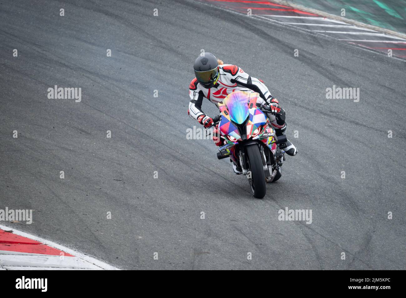 Moto BMW M1000RR doing drift in the track Stock Photo