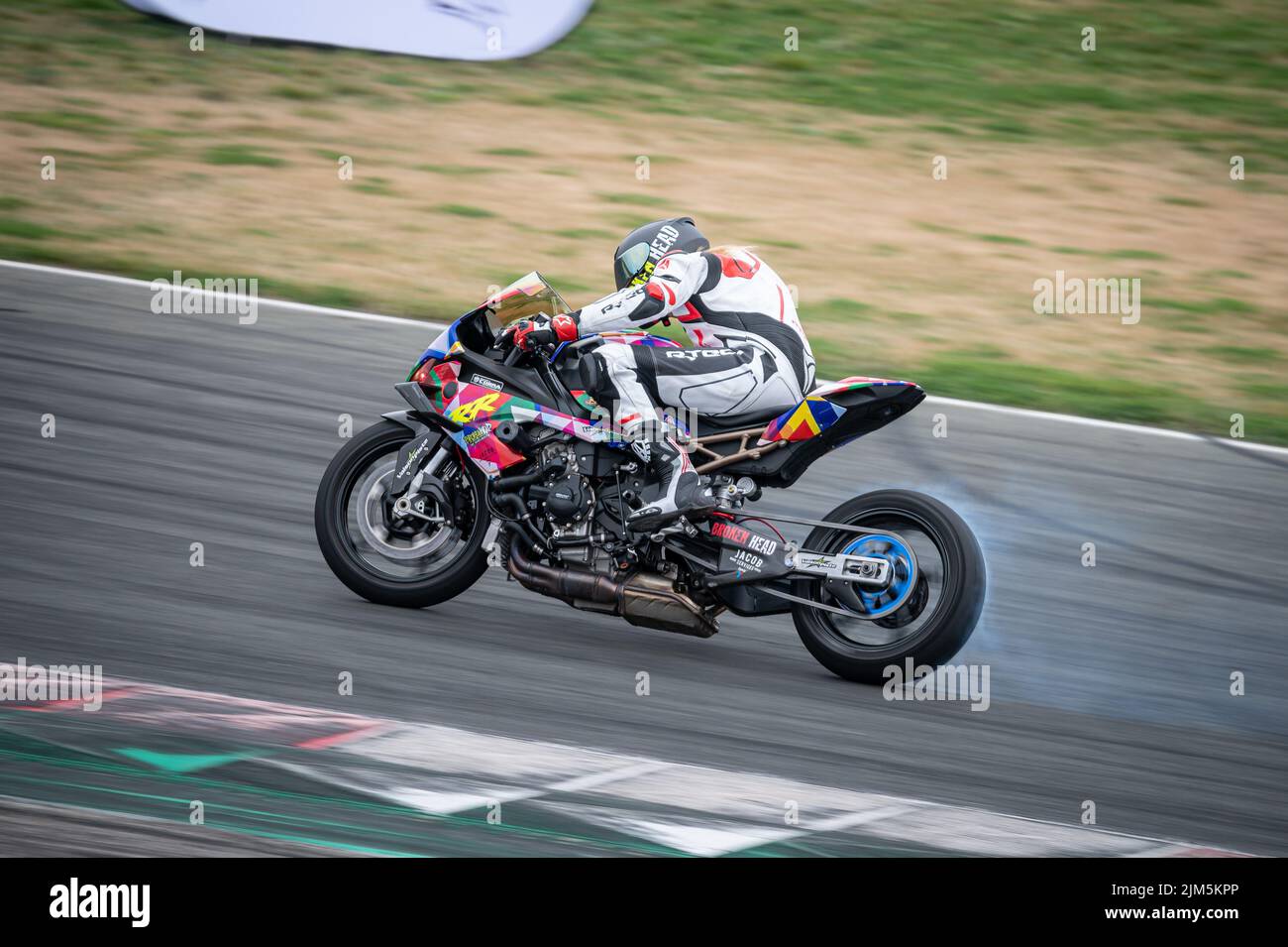 Moto BMW M1000RR doing drift in the track Stock Photo