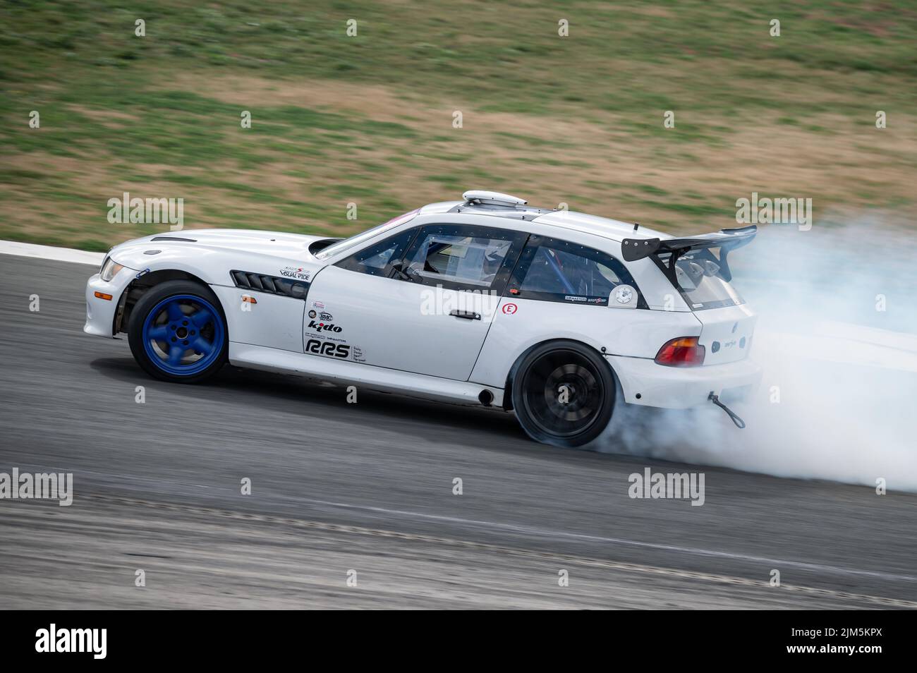 Whit BMW Z3 coupe E36 7 drifting on the circuit Stock Photo