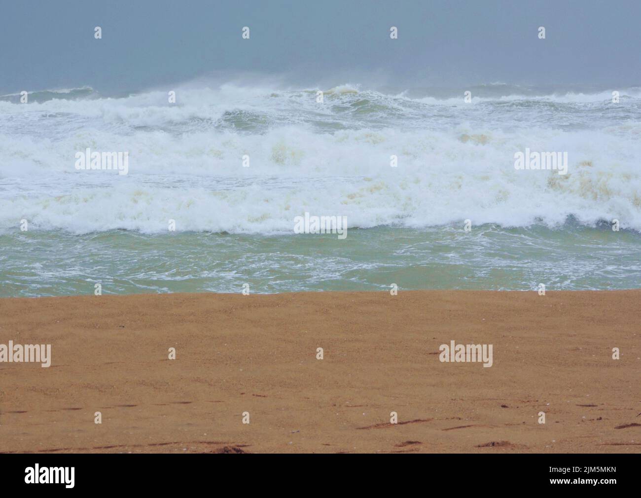 The foamy waves of the sea Stock Photo - Alamy
