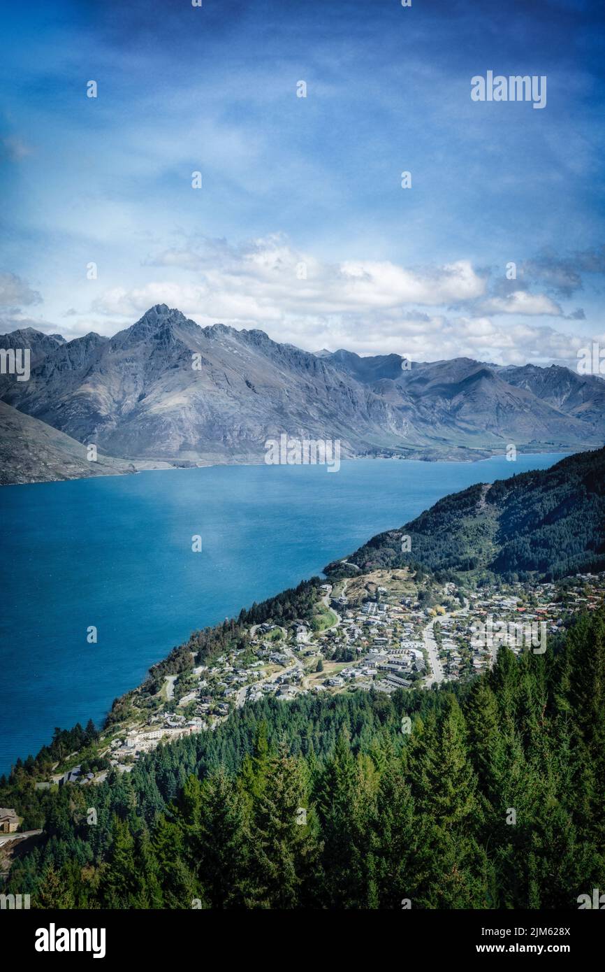 Queenstown sits on the shores of Lake Wakatipu on the South Island of New Zealand. Stock Photo