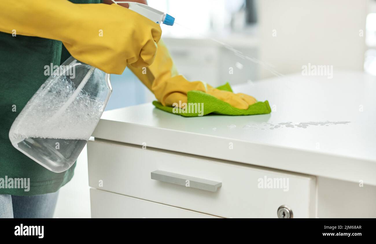 Clean it like you mean it. an unrecognisable woman cleaning a modern
