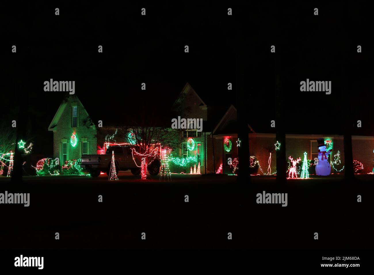 Augusta, Ga USA 12 20 21 Christmas lights on a house at night greens