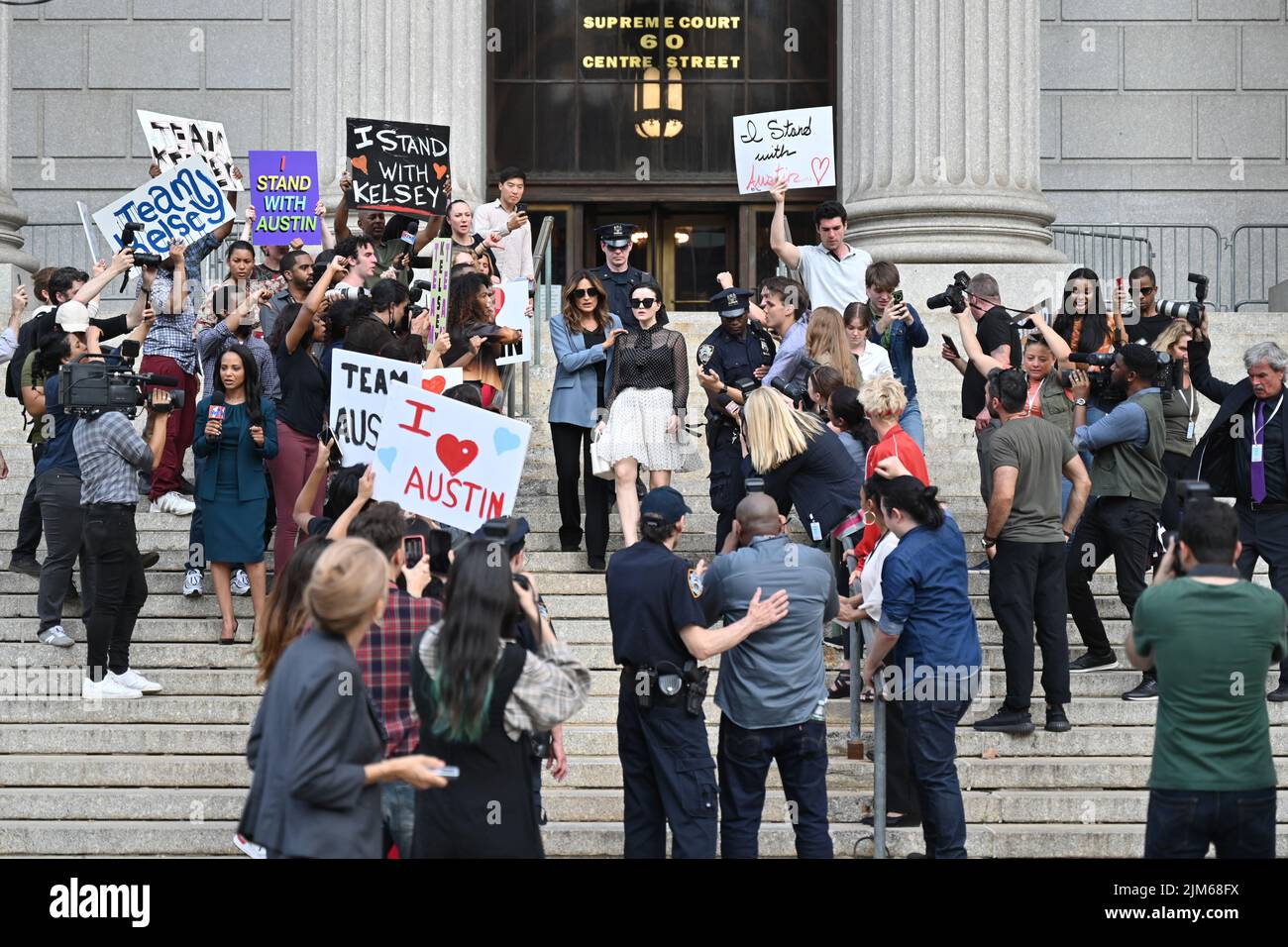 Mariska Hargitay (blue jacket) on the set of 'Law and Order: Special Victims Unit' filming outside the New York State Supreme Court Building on August Stock Photo