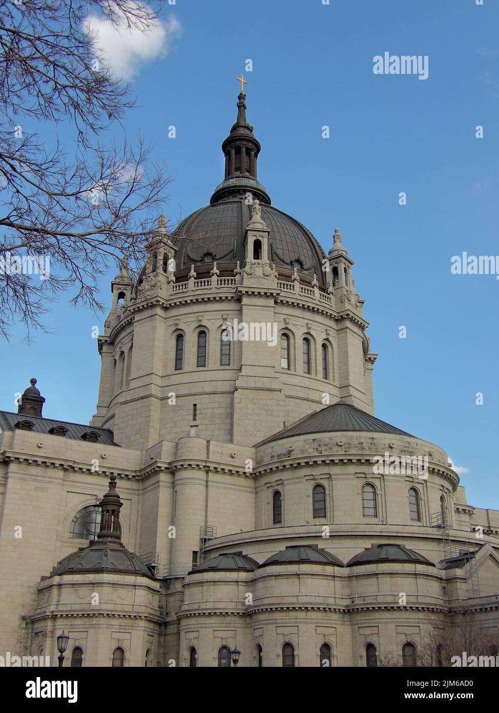 A Minnesota St paul cathedral catholic church with blue sky clouds tree ...