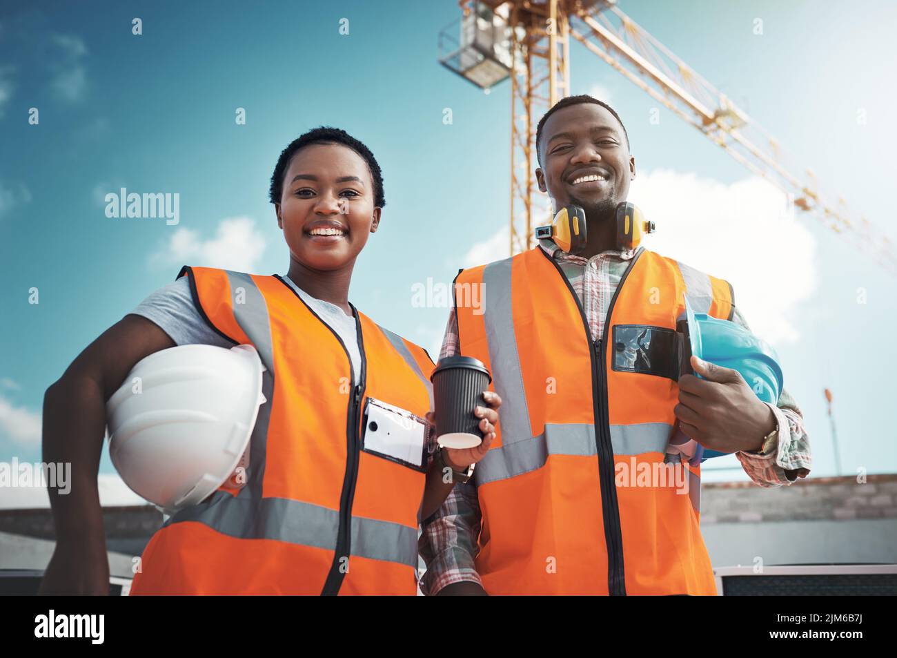 Prime property built on a foundation of equality. Portrait of a confident young man and woman working at a construction site. Stock Photo