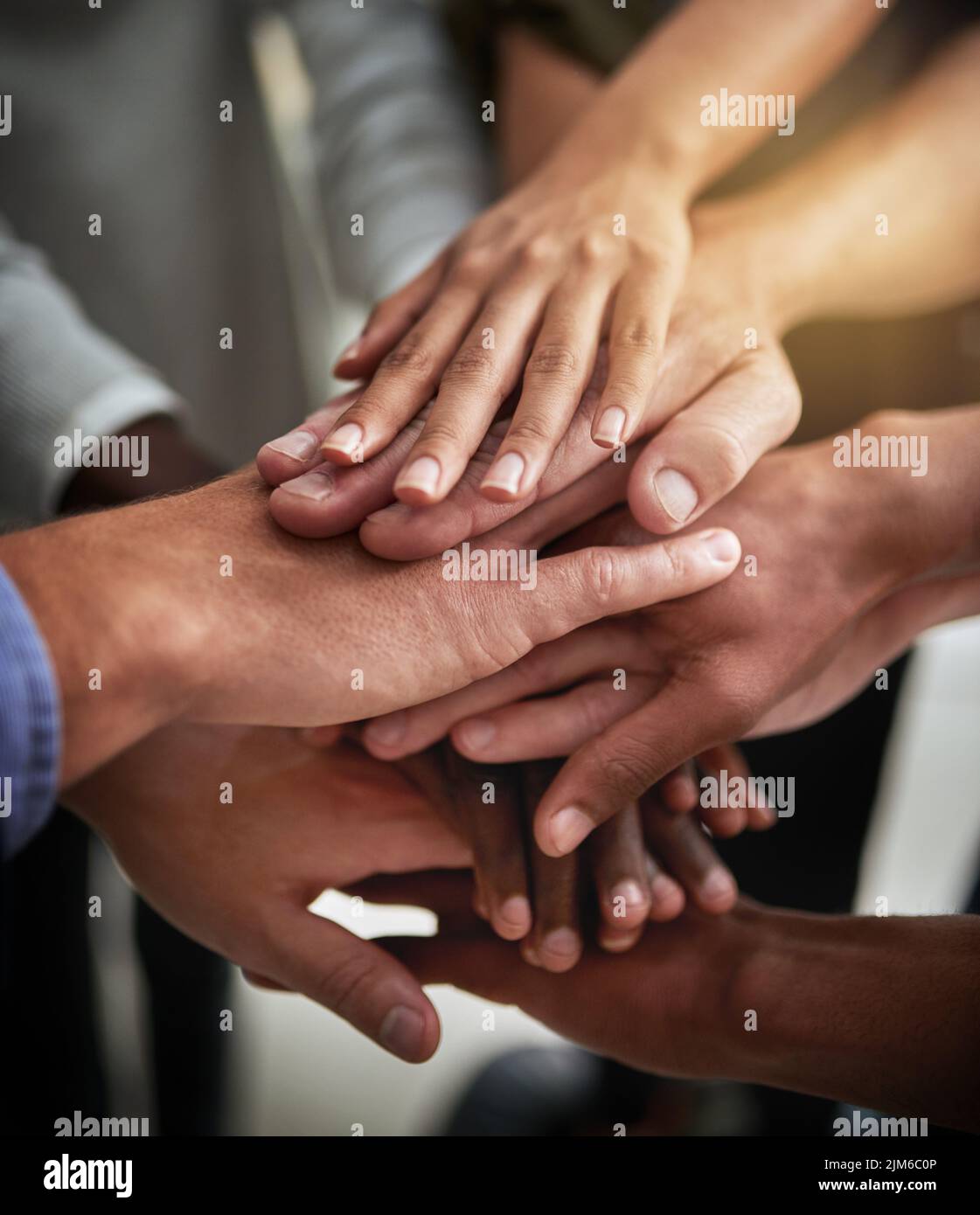 Hands of group of corporate business people in unity for motivation, success and showing teamwork. Team of workers, employees and colleagues piling Stock Photo