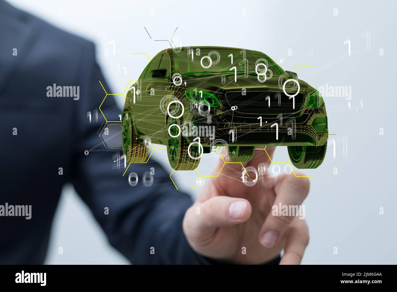 A hologram of a 3D rendered green car symbol with a person behind explaining about this car