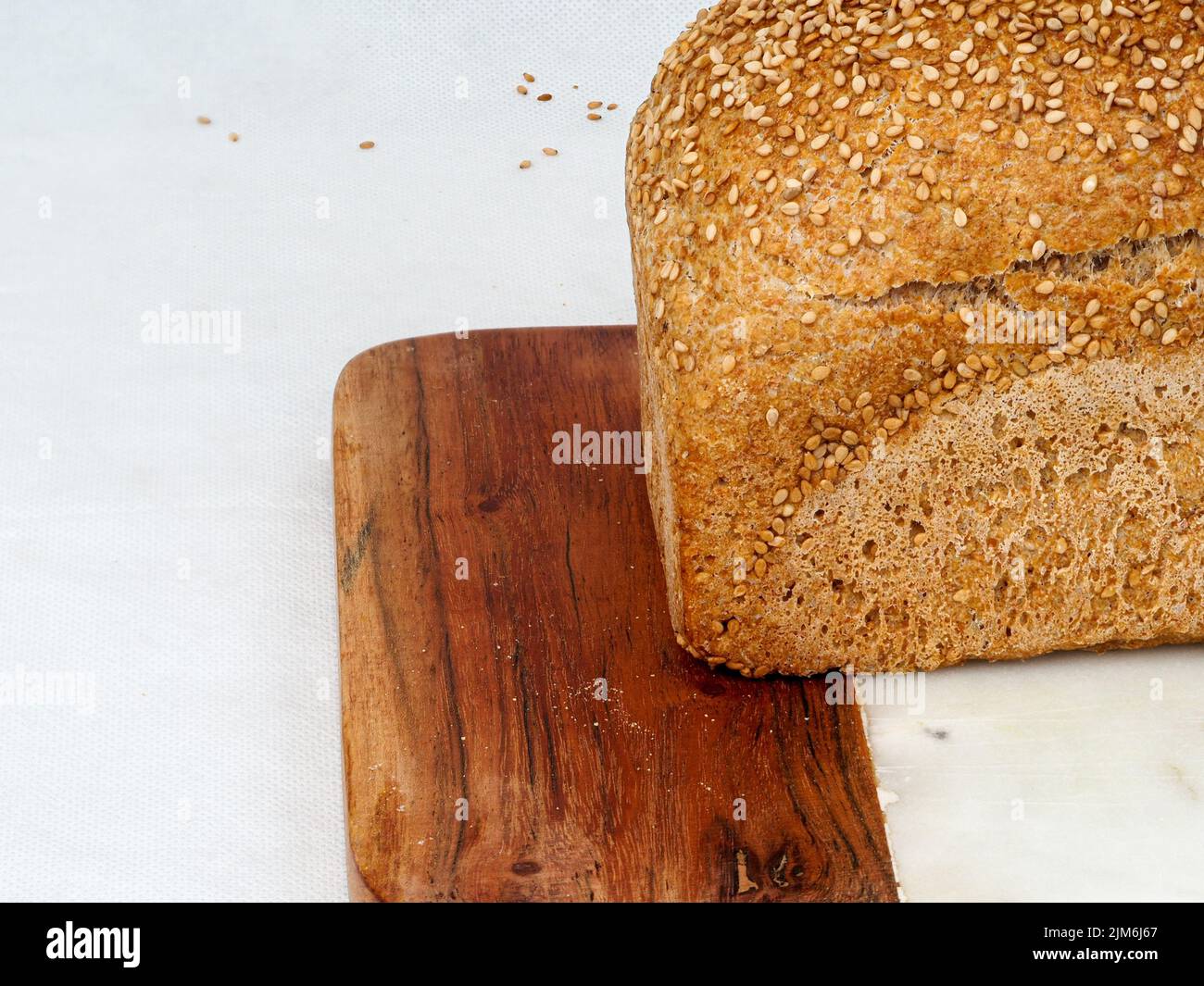 whole wheat gluten free bread with sesame seeds. view with copy space