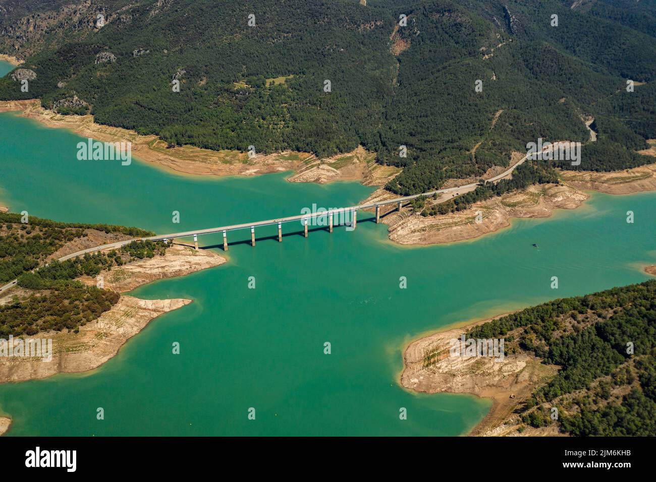 Aerial view of La Baells reservoir with little water during the summer drought of 2022 (Berguedà, Barcelona, Catalonia, Spain) Stock Photo