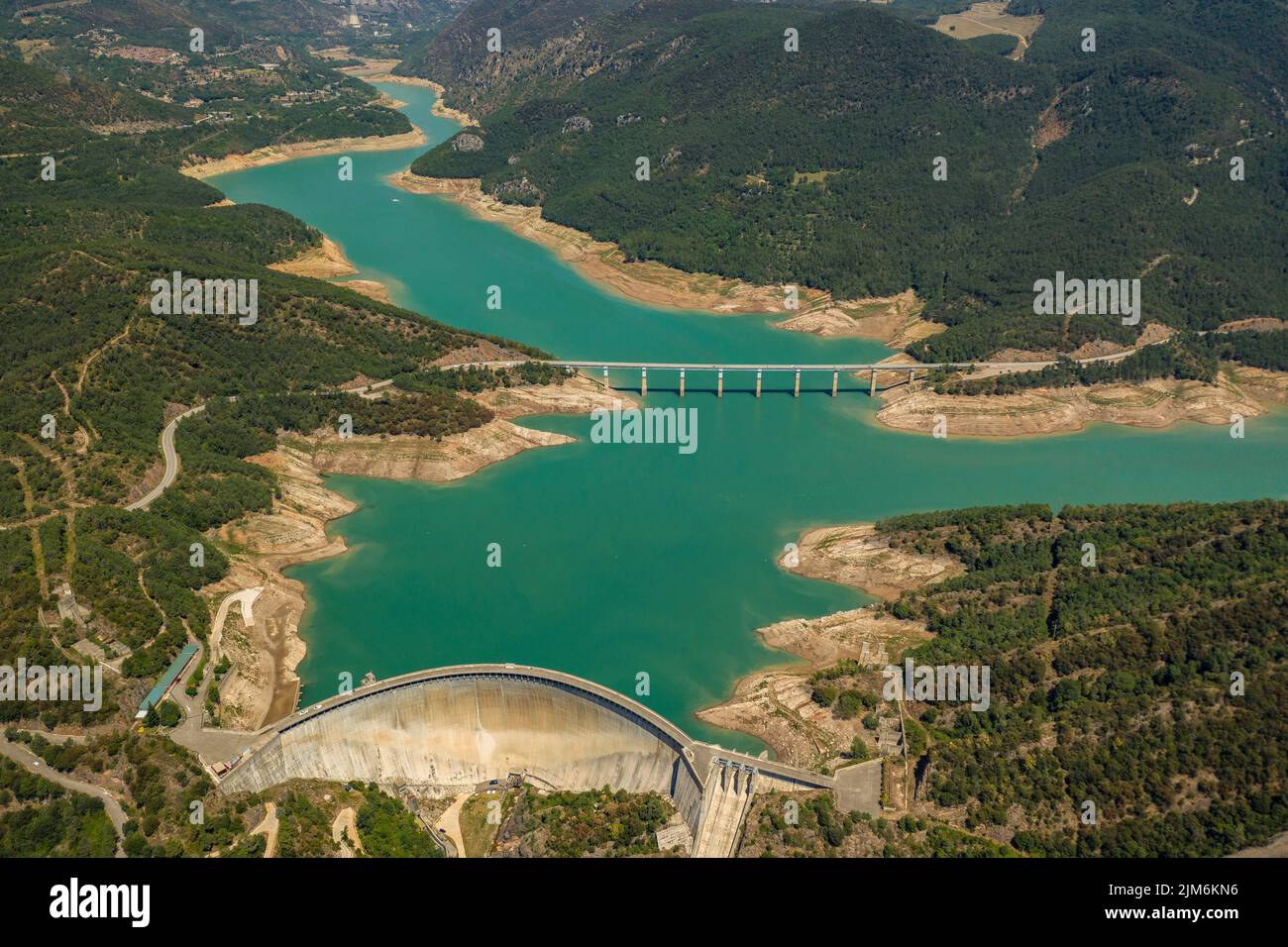 Aerial view of La Baells reservoir with little water during the summer drought of 2022 (Berguedà, Barcelona, Catalonia, Spain) Stock Photo