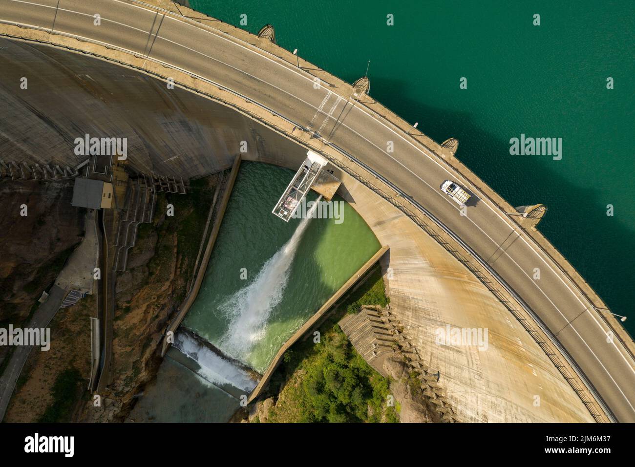 Aerial view of La Llosa del Cavall reservoir dam with little water during summer drought of 2022 (Vall de Lord, Solsonès, Lleida, Catalonia, Spain) Stock Photo