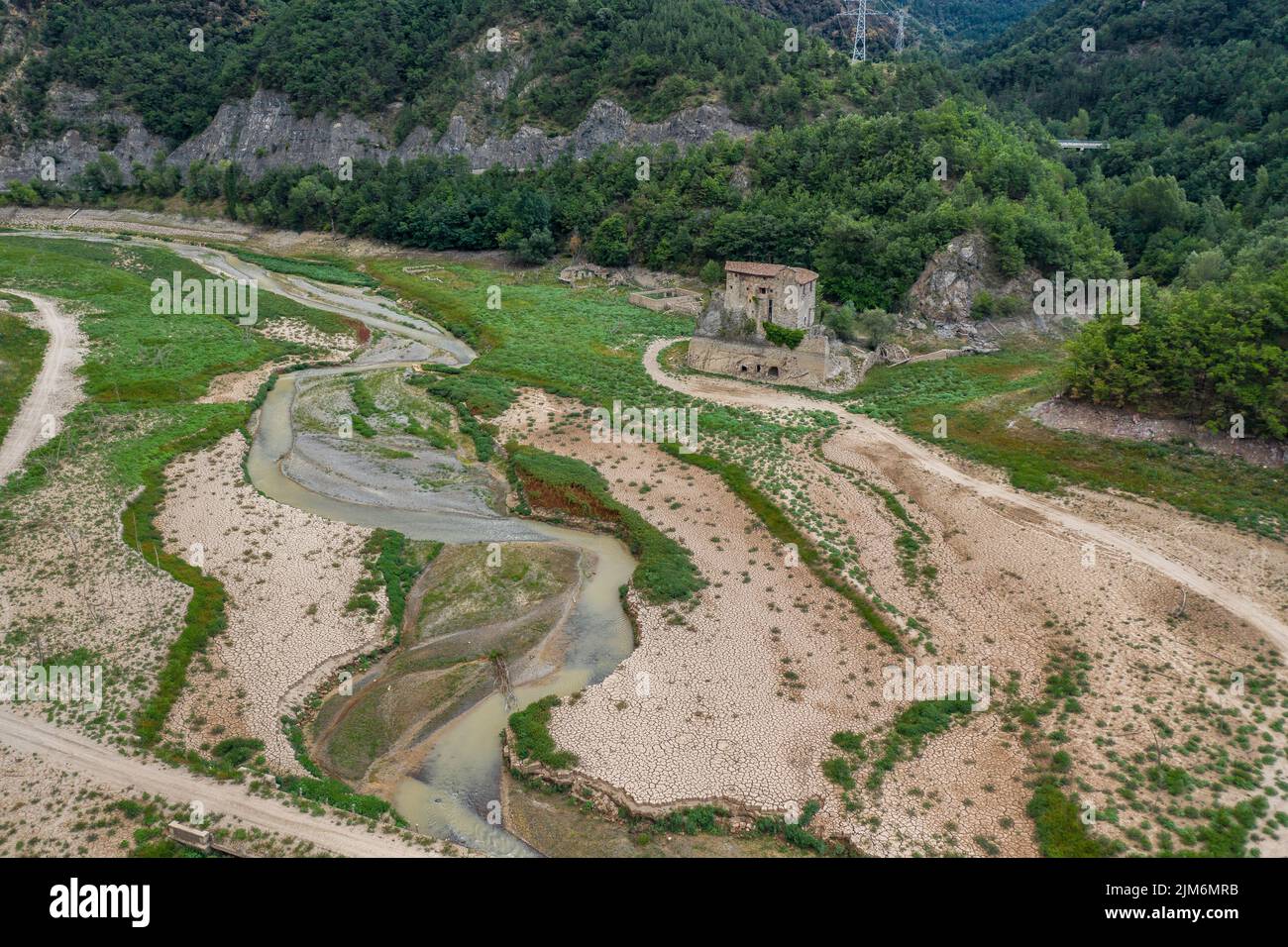 Aerial view of the area of Sant Salvador de la Vedella in the Baells reservoir completely dry during the drought of 2022 (Barcelona, Catalonia, Spain) Stock Photo