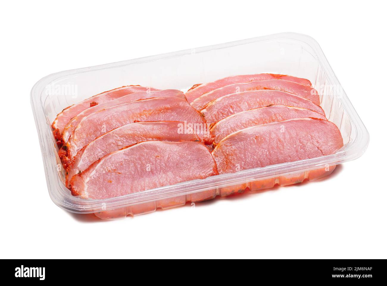 Marinated pork loin in plastic container isolated on white Stock Photo