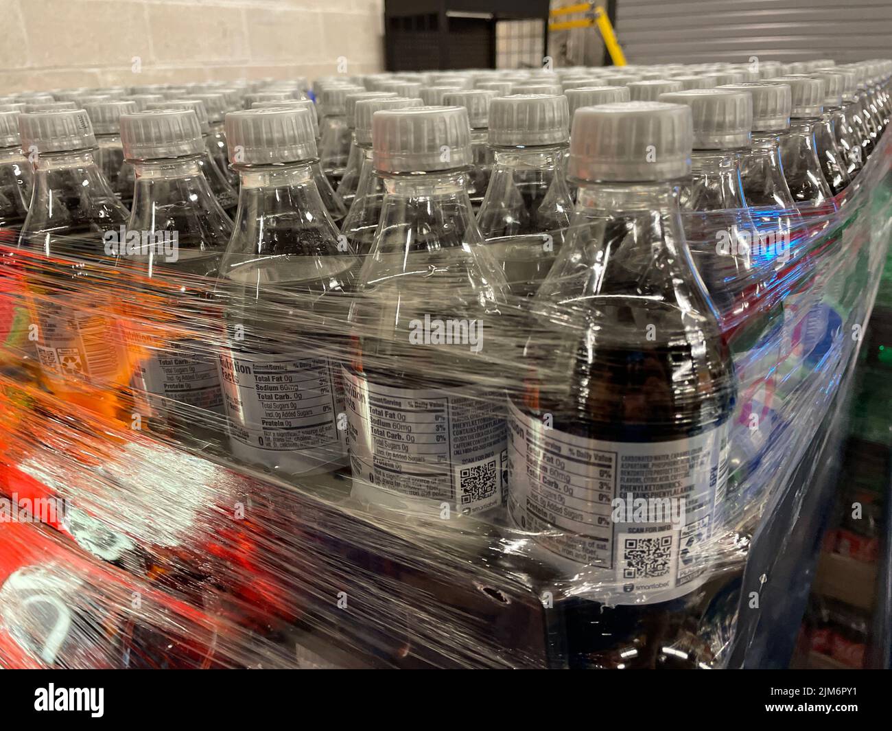 Grovetown, Ga USA - 05 03 22: Retail store drinks wrapped pallets delivery retail store coke Stock Photo