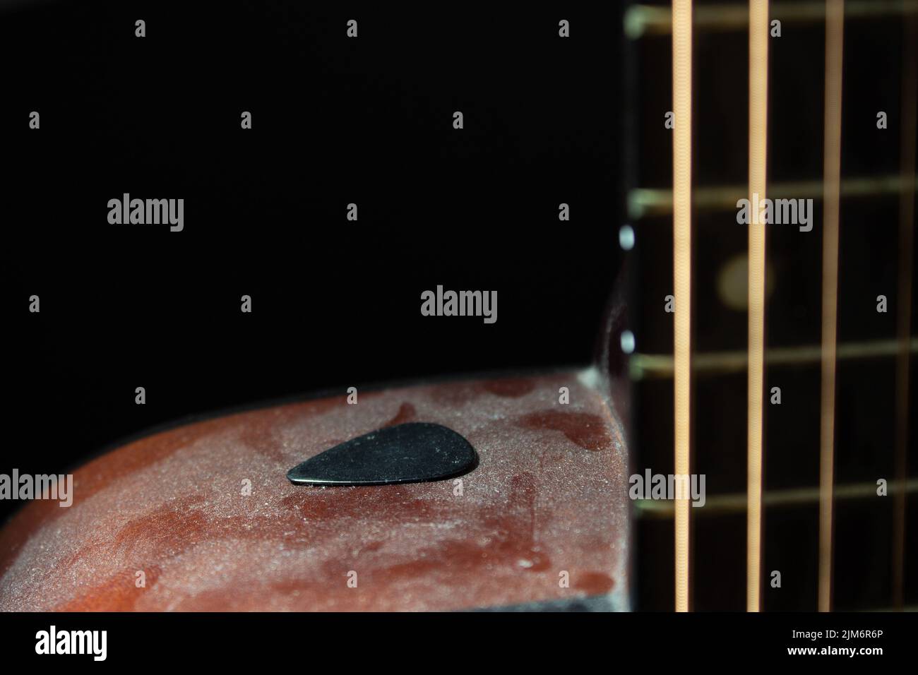 Dust guitar and pick Stock Photo Alamy