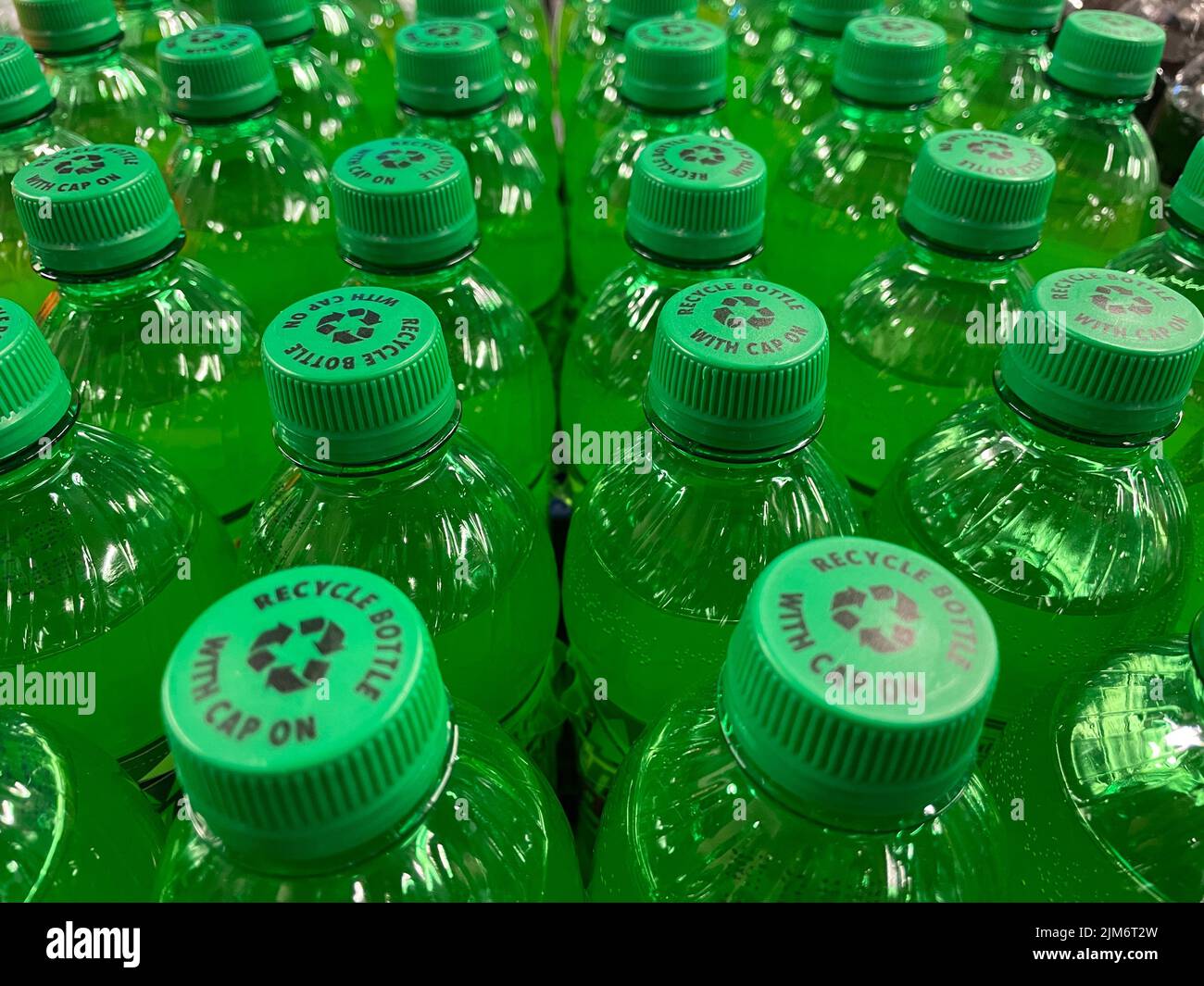 Grovetown, Ga USA - 12 21 21: Retail grocery store green bottle tops looking on Stock Photo