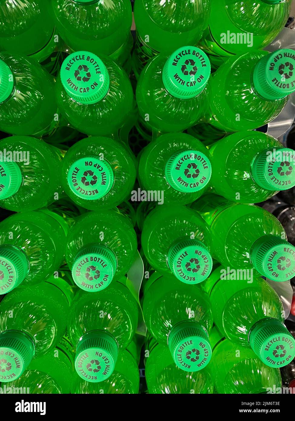 Grovetown, Ga USA - 12 21 21: Retail grocery store flat lay green bottle tops Stock Photo