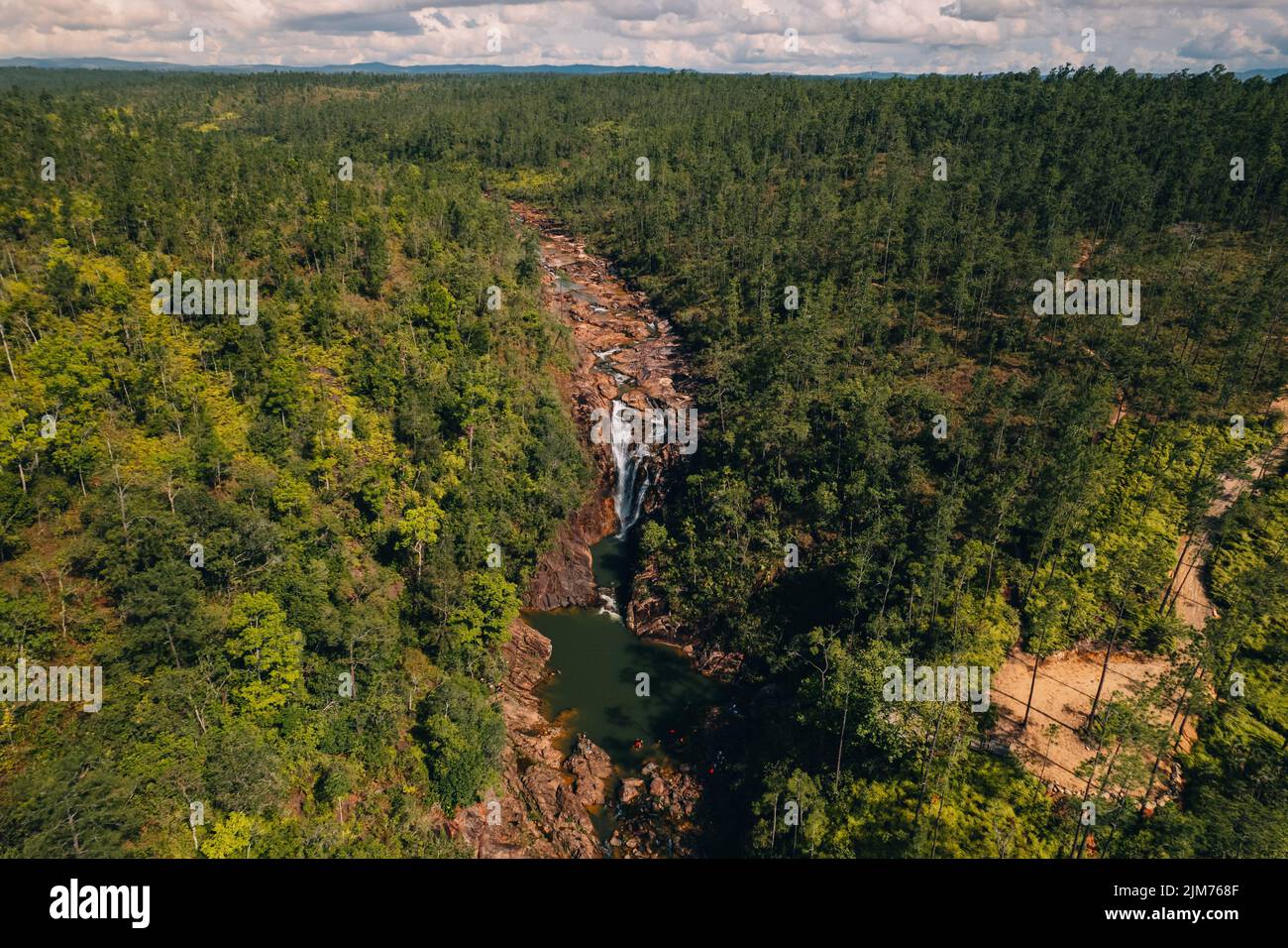 An aerial view of Big Rock Falls in Mountain Pine Ridge, Cayo District, Belize with green forest trees Stock Photo