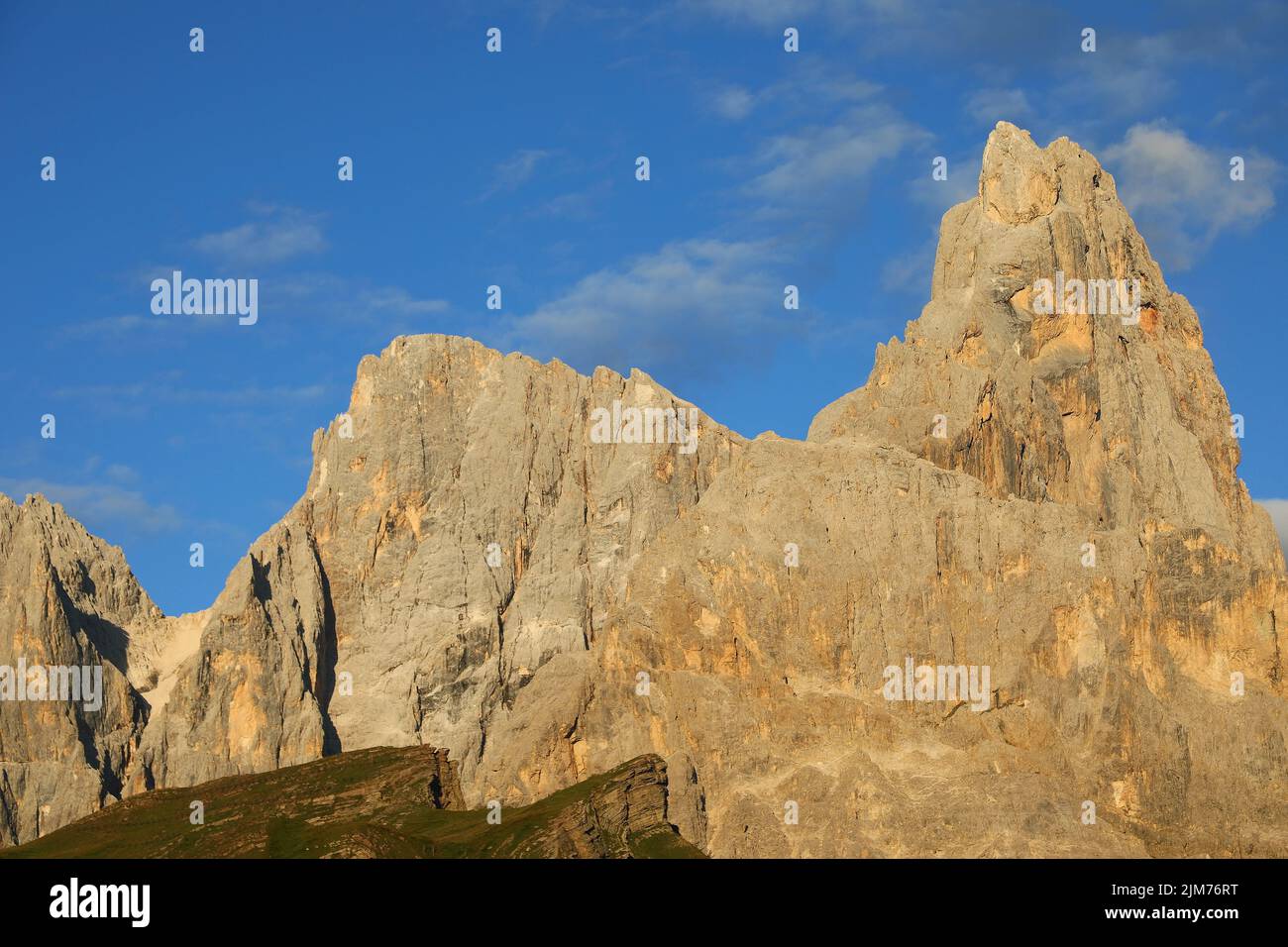 Italian Dolomites called CIMA VEZZANA e CIMON DELLA PALA with orange colors by optical effect called Alpenglow Stock Photo