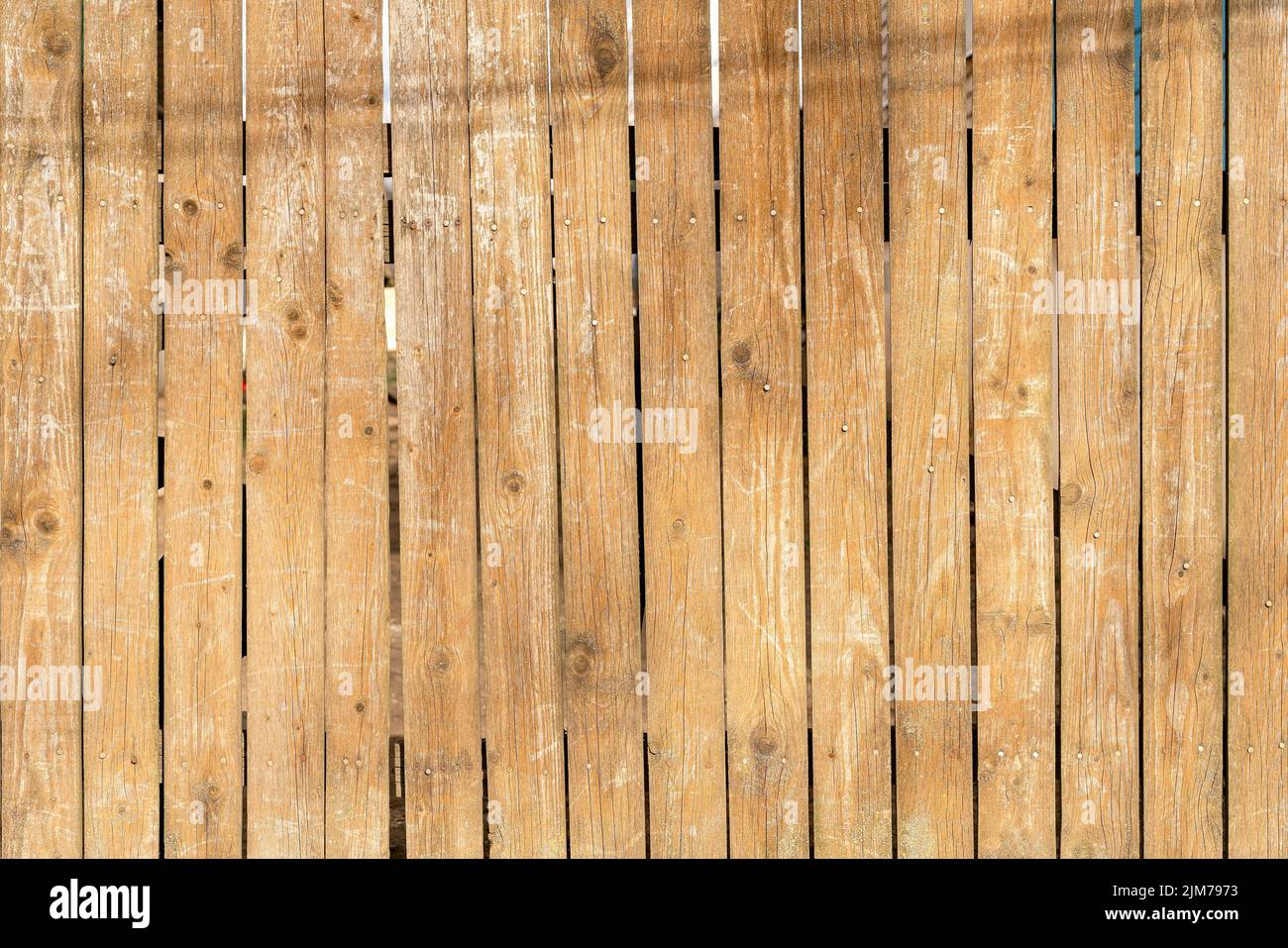 A closeup of a vintage fence with old wooden boards Stock Photo - Alamy