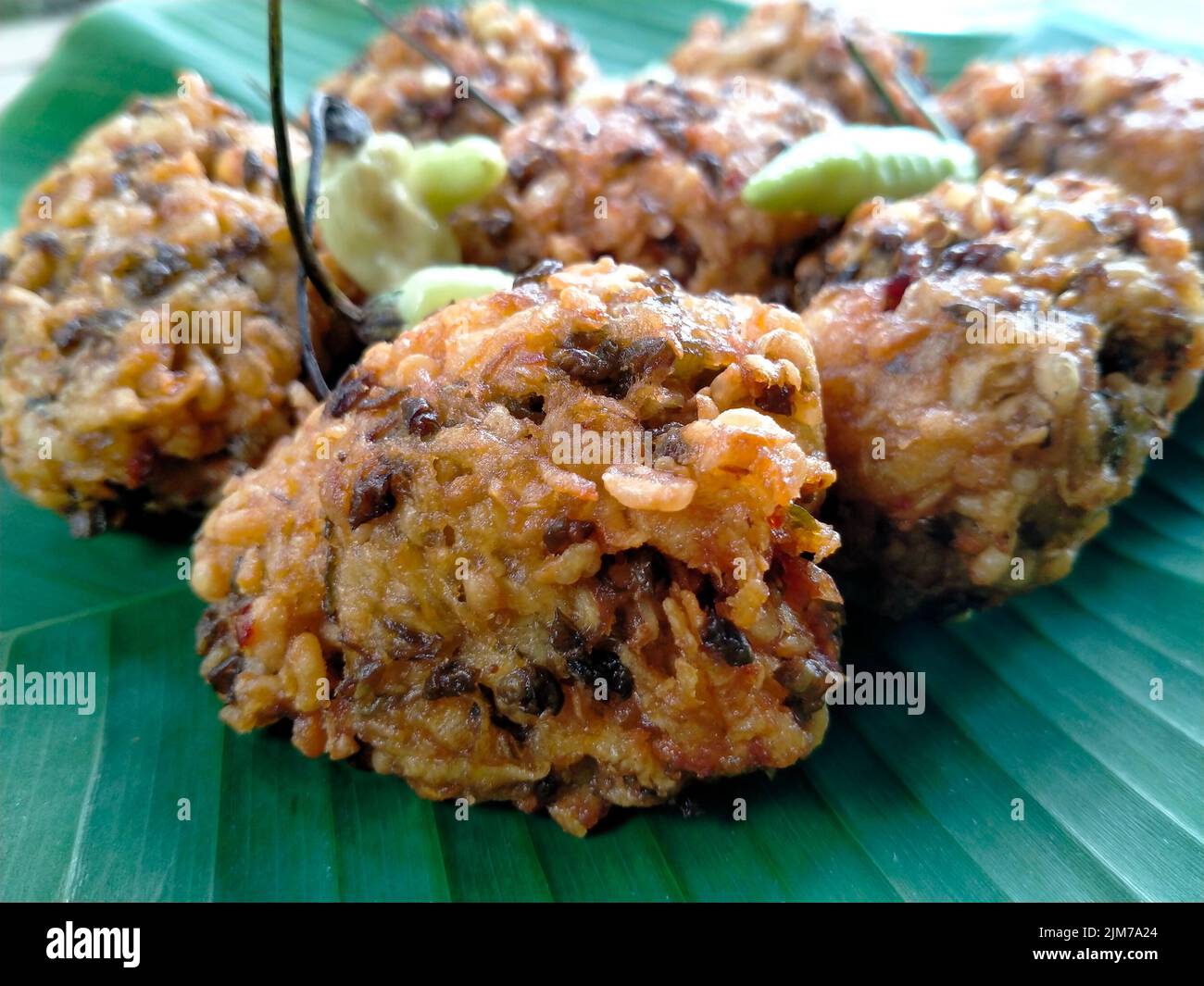 lento food from Indonesia. banana leaf background. close up shot outdoors. Stock Photo