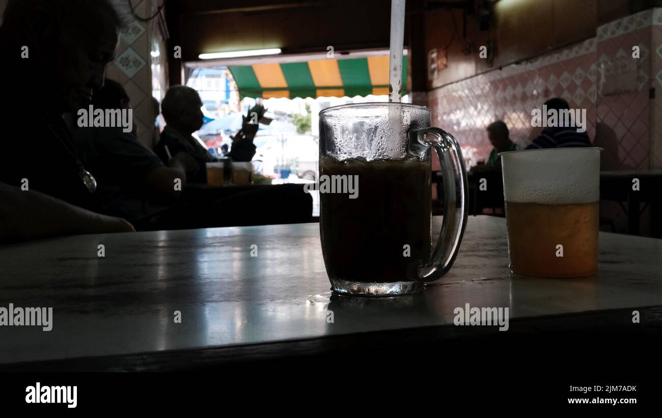 Ice Coffee with Ice Tea as a Chaser Coffee shop Chinatown Bangkok Thailand Stock Photo