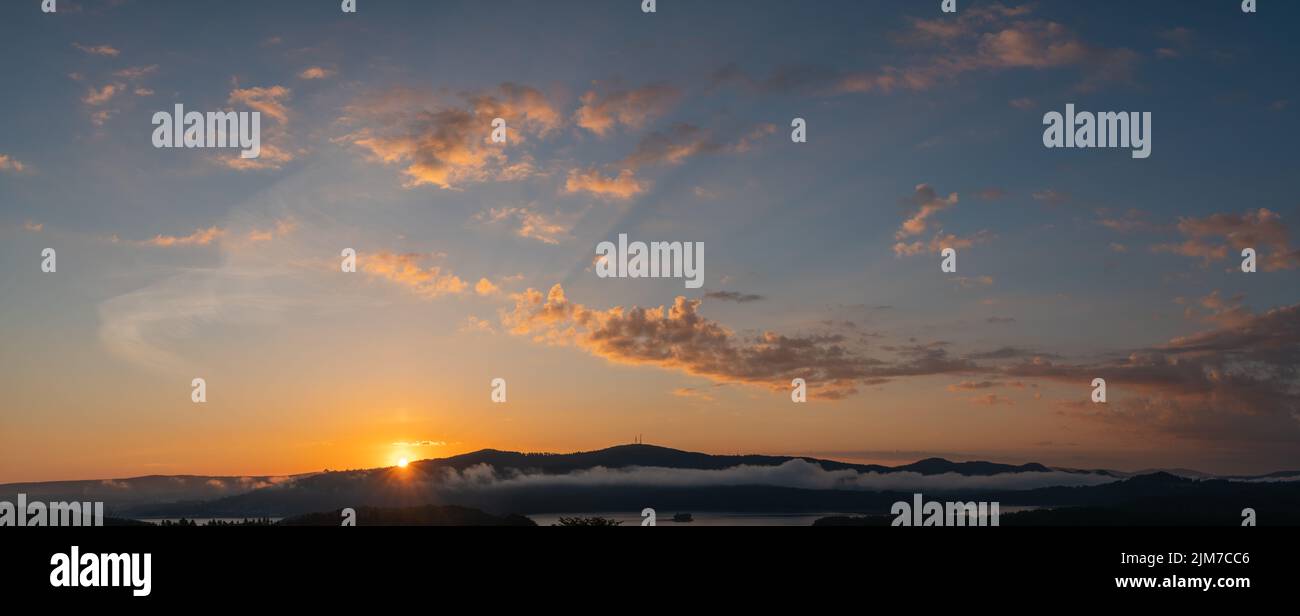 Panorama of a dramatic evening sky Stock Photo