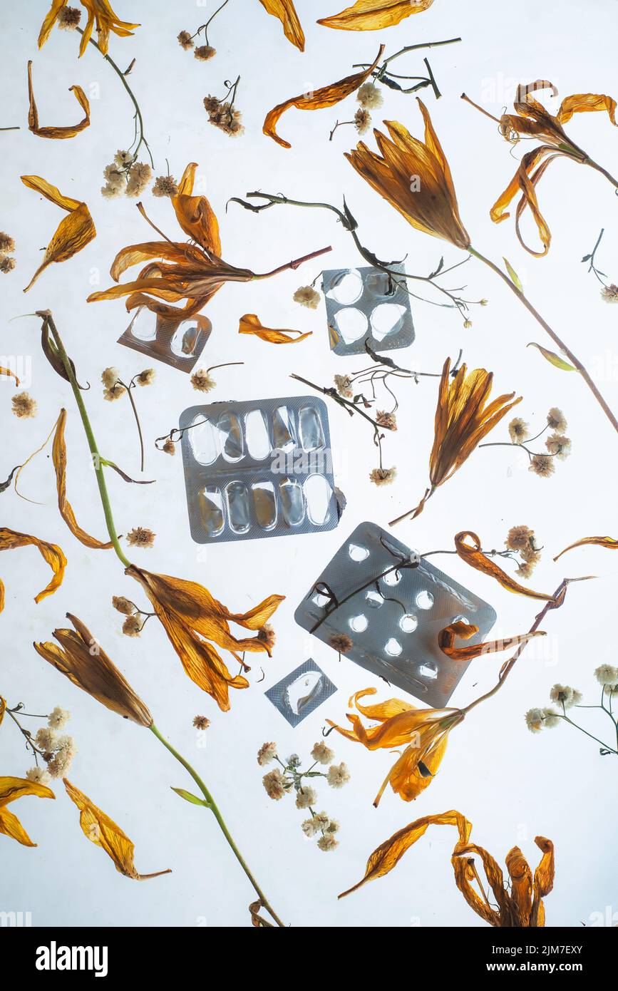 Pill blisters, meds pattern with flowers, antidepressants Stock Photo