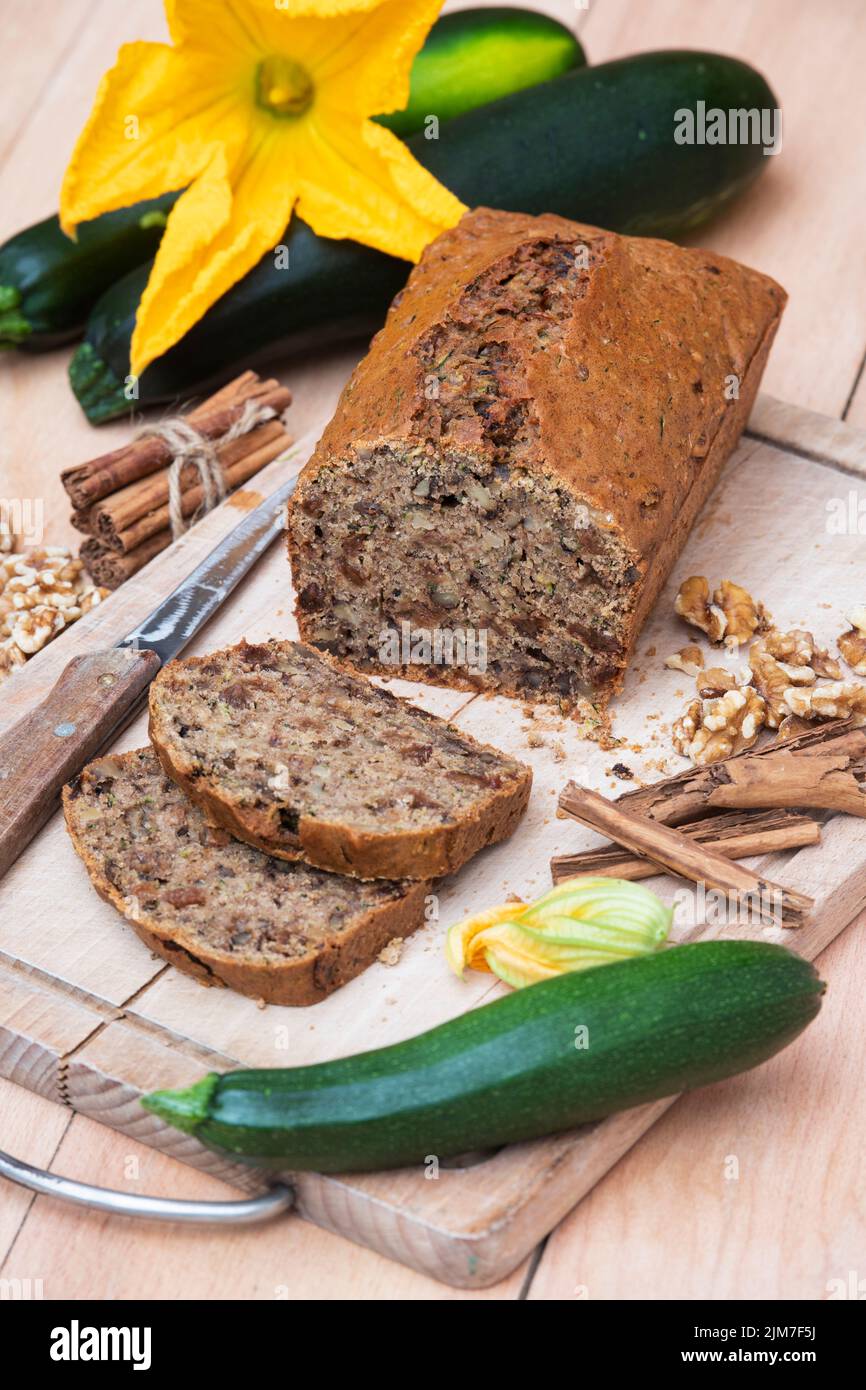 Homemade courgette loaf cake with walnuts, cinnamon and sultanas Stock Photo