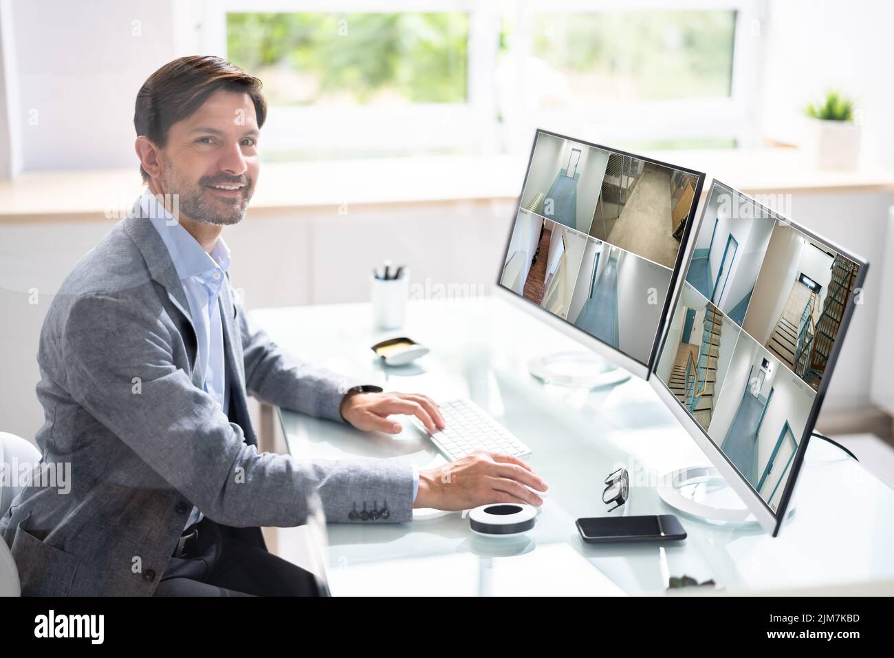 Business Security Monitor Tech. Video Camera CCTV System Stock Photo